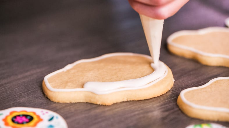 Flooding a sugar skull cookie