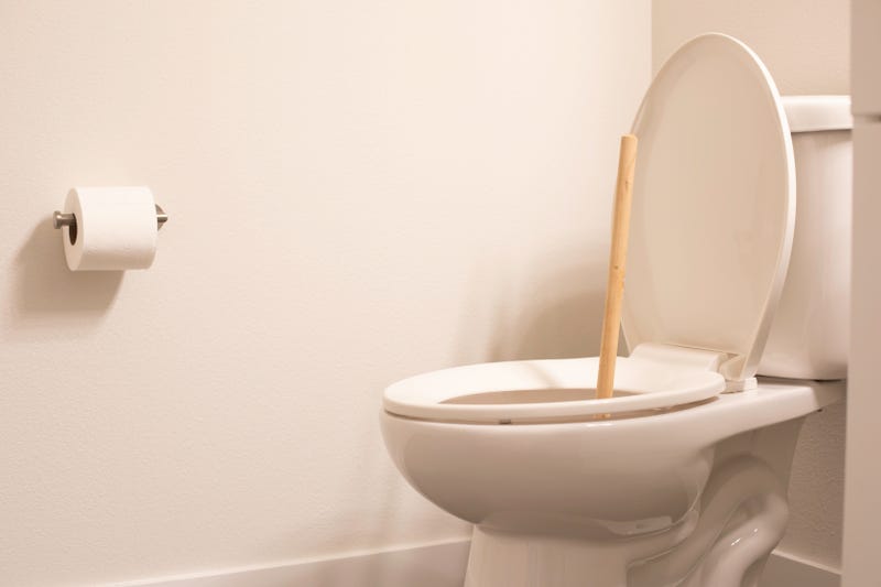 Plunger in a toilet