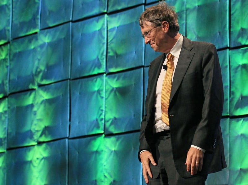 bill gates greets the crowd