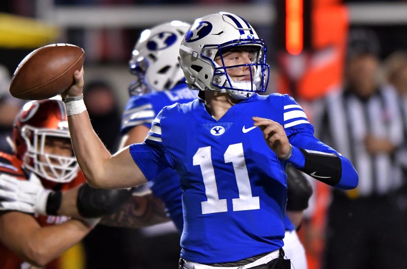 BYU quarterback Zach Wilson about to throw a pass.