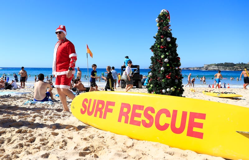 santa celebrates christmas on the beach