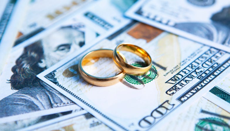 Wedding Rings On Money
