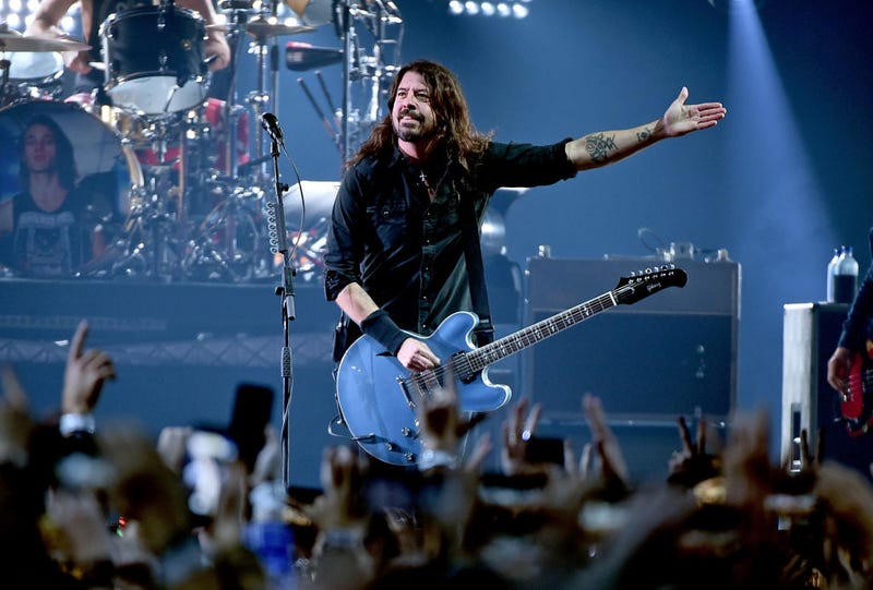 dave grohl on stage with guitar