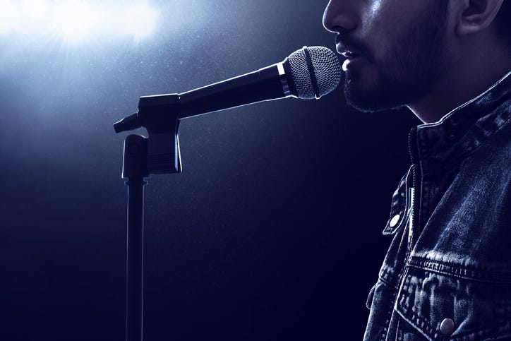 Man At Microphone