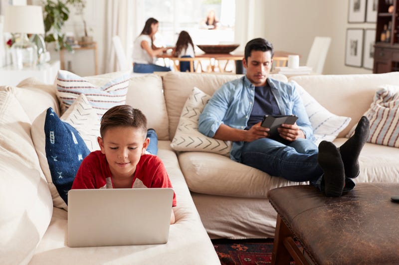 family on new electronic devices