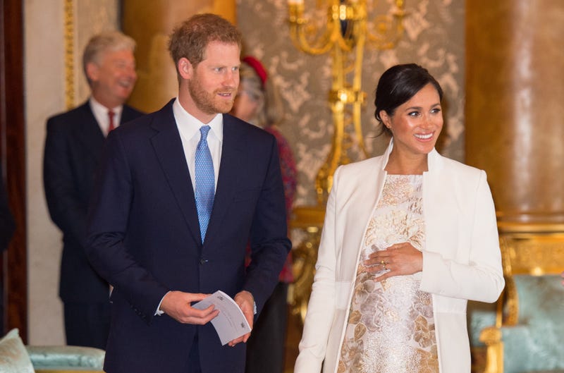 meghan markle and prince harry and prince charles's 50th anniversary investiture reception at buckingham palace