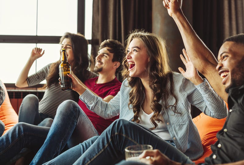 friends watching super bowl commercials