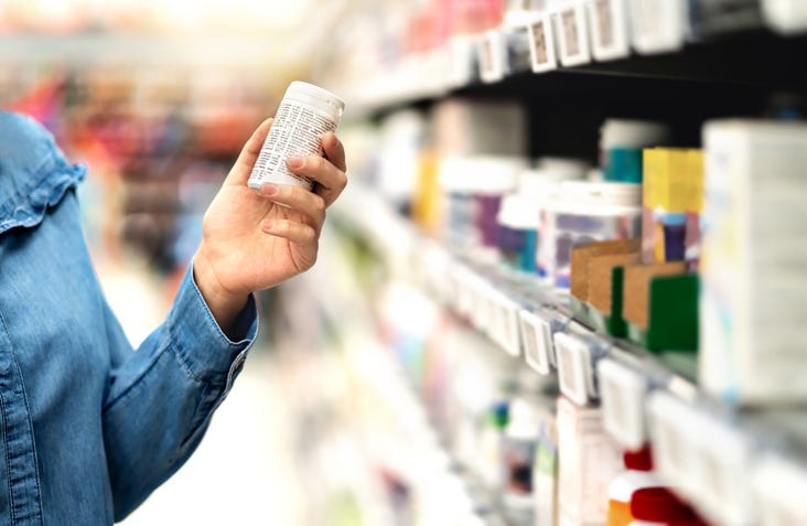 Person buying vitamins.