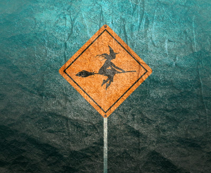 Yellow road sign. Halloween