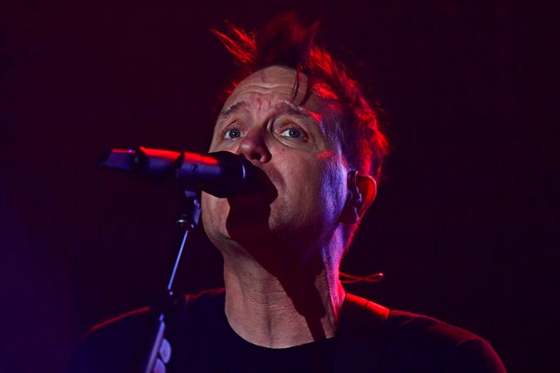 Mark Hoppus singing on stage