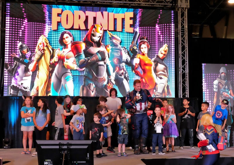 Attendees compete in a 'Fortnite' dance competition during the Seventh Annual Amazing Las Vegas Comic Con at the Las Vegas Convention Center.