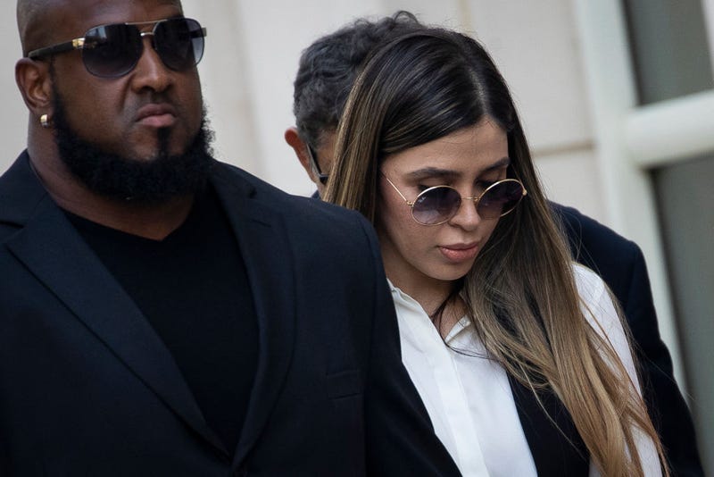 Emma Coronel Aispuro, wife of Joaquin "El Chapo" Guzman, is escorted by security as she leaves federal court, July 17, 2019 in the Brooklyn borough of New York City. El Chapo was sentenced to life in prison after being found guilty on all charges in a drug conspiracy trial.
