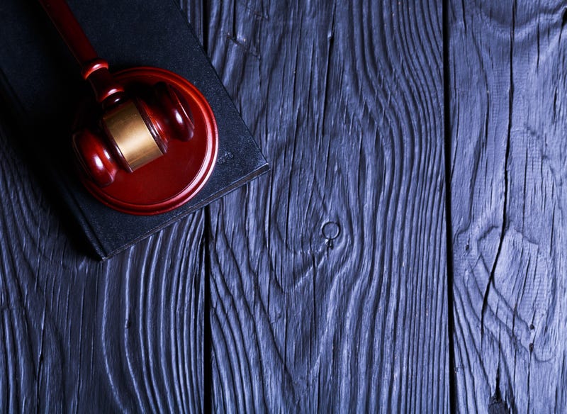 Gavel on dark background.