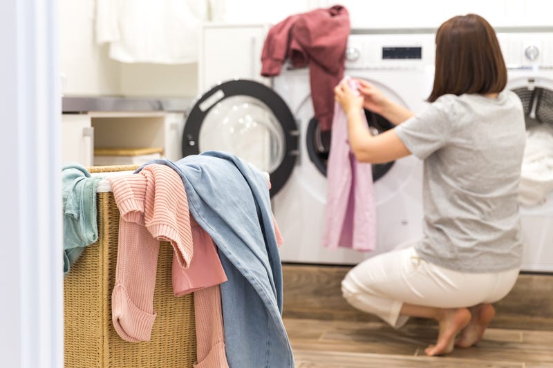 A woman doing laundry