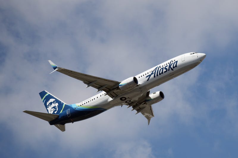 A Boeing 737-990 (ER) operated by Alaska Airlines takes off from JFK Airport