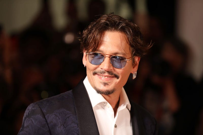 Johnny Depp walks the red carpet ahead of the "Waiting For The Barbarians" screening during the 76th Venice Film Festival at Sala Grande on September 06, 2019 in Venice, Italy