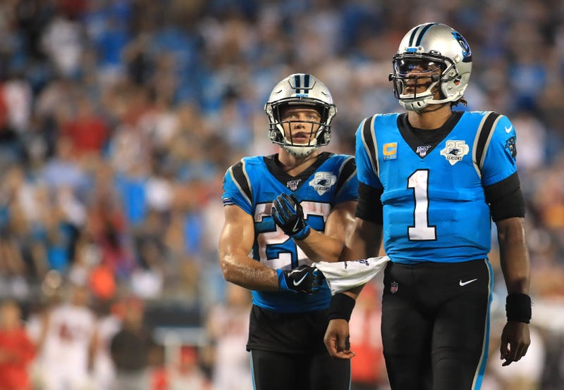 Christian McCaffrey and Cam Newton
