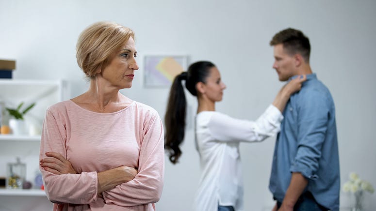 Mother-in-law glaring at couple