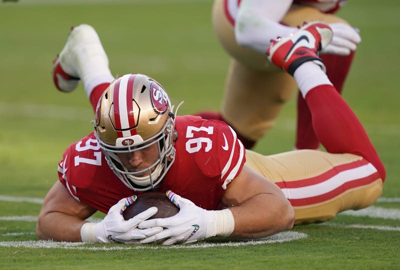 Nick Bosa falls on a Browns fumble