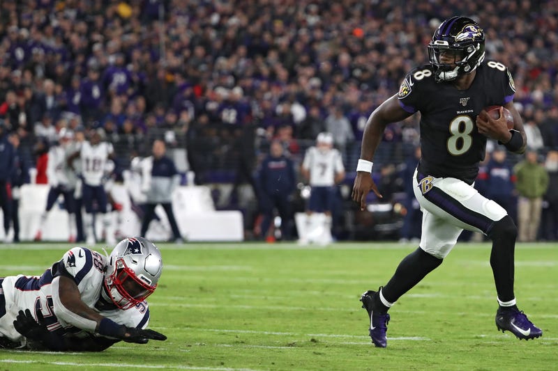 Lamar Jackson jets to the end zone for six