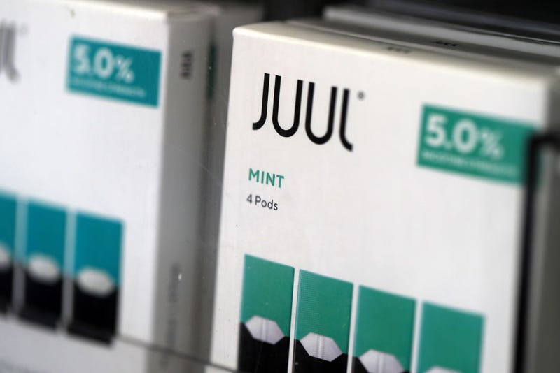 Packages of Juul mint flavored e-cigarettes are displayed at San Rafael Smokeshop on November 07, 2019 in San Rafael, California. Juul, a leading e-cigarette company, announced that it is halting sales of their popular mint flavor e-cigarette after the release of two studies that showed a surge in teen use. (Photo by Justin Sullivan/Getty Images)