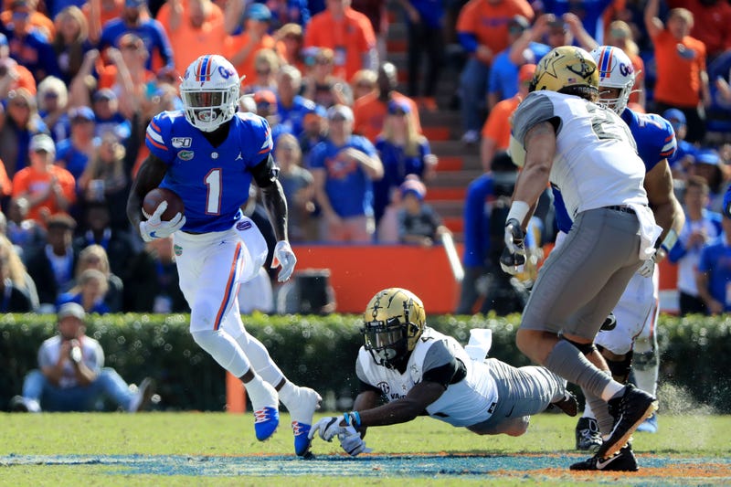 Florida's CJ Henderson eludes a defender