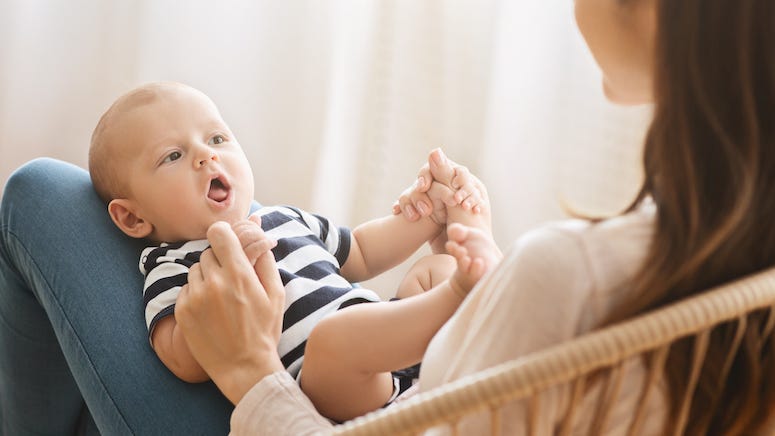 Baby talking to mom