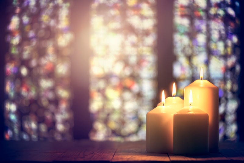 Prayer candles burning in a church