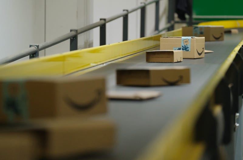 BRIESELANG, GERMANY - NOVEMBER 28: Packages flow along a conveyor belt at an Amazon packaging center on November 28, 2019 in Brieselang, Germany. Amazon is anticipating a strong holiday season and has hired extra workers at its packaging center across Germany. Meanwhile workers at some of the centers, though not at Brieselang, have announced strikes to further their demands for better pay.