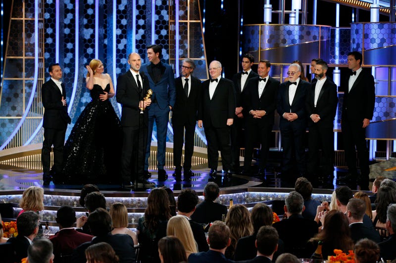 In this handout photo provided by NBCUniversal Media, LLC, Jesse Armstrong and the cast of "Succession", Kieran Culkin, Sarah Snook, Nicholas Braun, Alan Ruck, Brian Cox and Jeremy Strong, accept the award for BEST TELEVISION SERIES - DRAMA for "Succession" onstage, with Golden Globe Ambassador Paris Brosnan, during the 77th Annual Golden Globe Awards at The Beverly Hilton Hotel on January 5, 2020 in Beverly Hills, California.