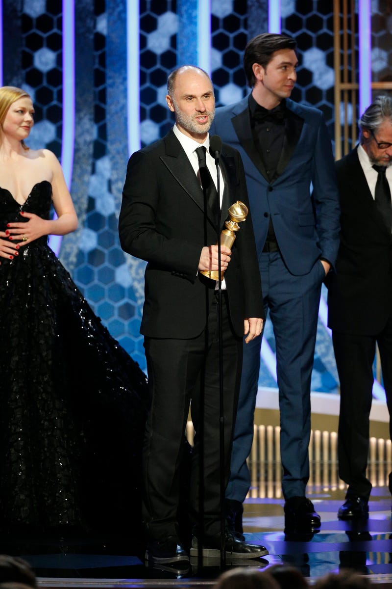 Showrunner Jesse Armstrong accepts award