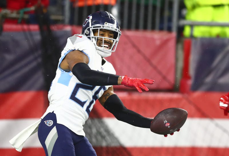 Titans DB Logan Ryan spikes the football after a big interception