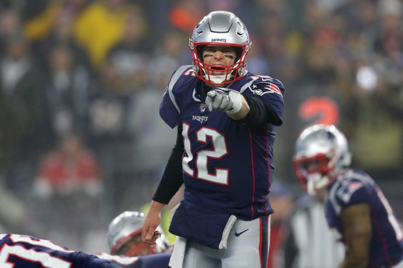 Patriots QB Tom Brady commands the huddle