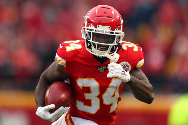 Darwin Thompson runs hard in a 2019 game.