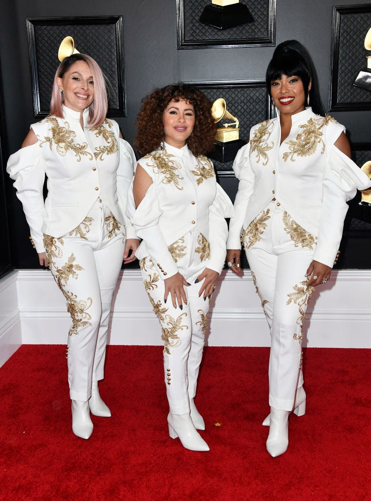 Shae Fiol, Julie Acosta and Mireya Ramos of the band Flor de Toloache attend the 62nd Annual GRAMMY Awards at STAPLES Center on January 26, 2020 in Los Angeles, California.