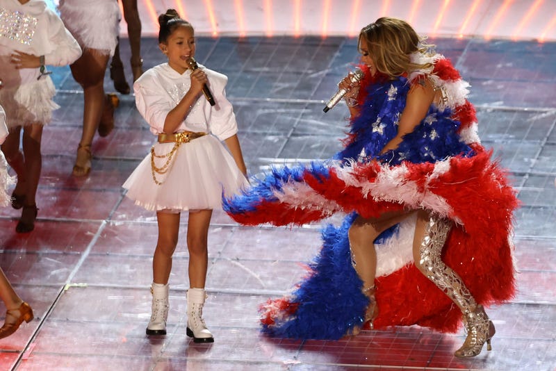 Singer Jennifer Lopez and her daughter Emme Maribel Muñiz perform while a Puerto Rican flag is displayed on stage during the Pepsi Super Bowl LIV Halftime Show at Hard Rock Stadium on February 02, 2020 in Miami, Florida.
