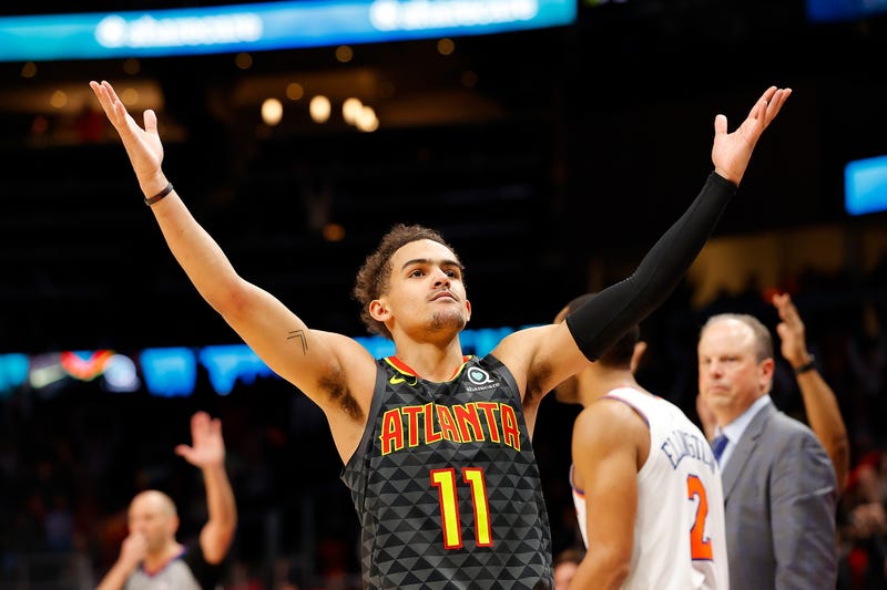 Hawks guard Trae Young celebrates after knocking down a big shot