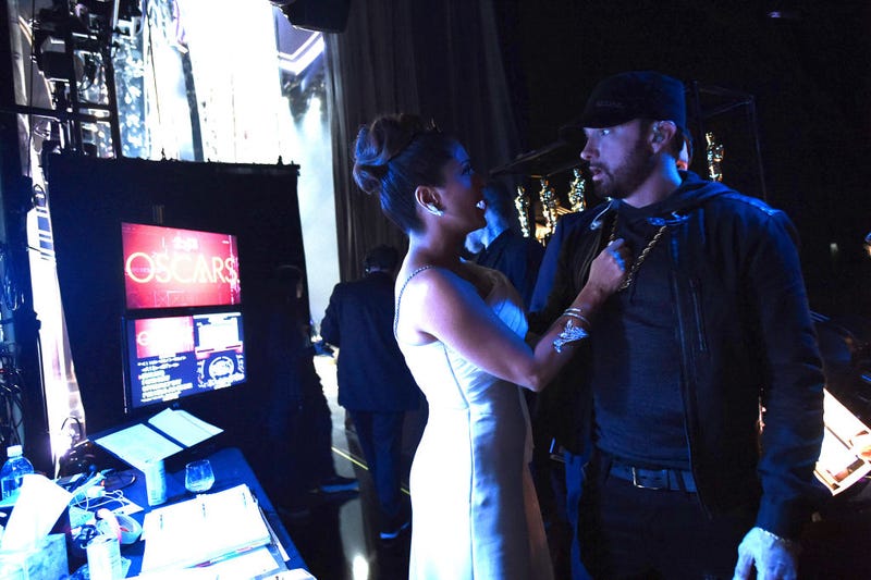 In this handout photo provided by A.M.P.A.S. Salma Hayek Pinault and Eminem pose backstage during the 92nd Annual Academy Awards at the Dolby Theatre on February 09, 2020 in Hollywood, California.