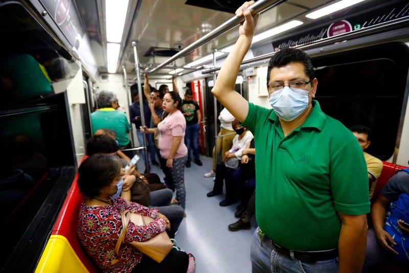 Commuters using the light rail transit train, wear face mask as a preventive measure to avoid the infection of COVID-19, on March 27, 2020 in Guadalajara, Mexico. While most countries and major cities have ordered a lockdown to halt COVID-19 spread, Mexican president Lopez Obrador has not called for national quarantine yet. His critics argue he downplays on coronavirus threat as he seek to protect the economy. In Guadalajara, measures to avoid the spread of the COVID-19 have been taken, schools of all levels are closed since March 16, business around the city must shut down and many tests will be taken in people suspected to be infected. 64 cases have been confirmed in Mexican State of Jalisco.