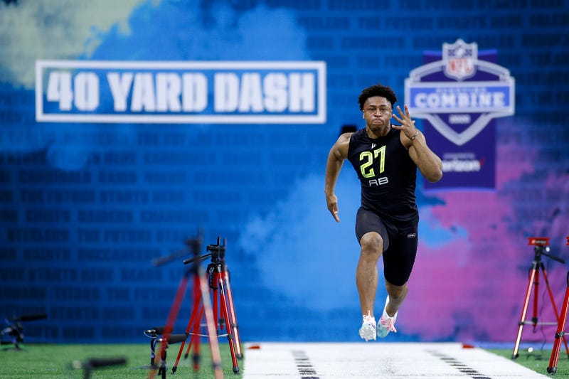 Miami could use one of its first-round picks on Wisconsin star Jonathan Taylor