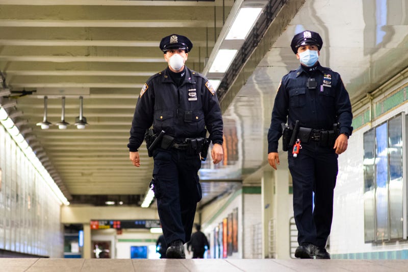 File photo: NYPD officers patrol inside Times Square station last May