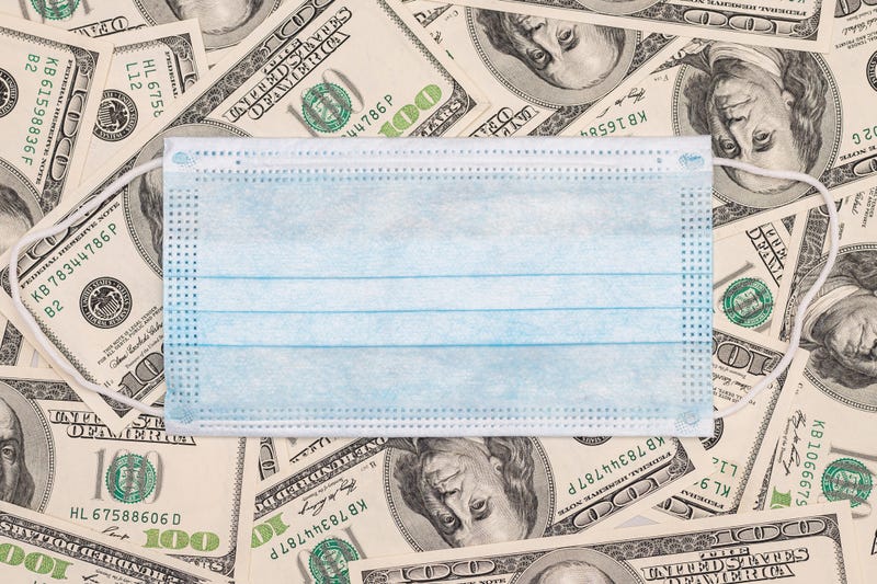 medical mask on bank notes