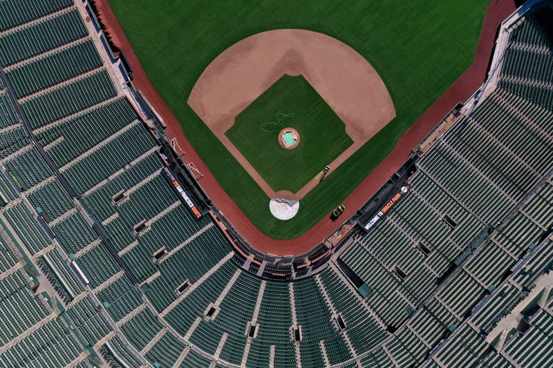 An aerial view from a drone shows Oracle Park, home of the San Francisco Giants, empty on Opening Day March 26, 2020 in San Francisco, California.