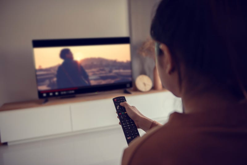 watching television