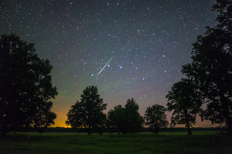 Shooting star at sunset
