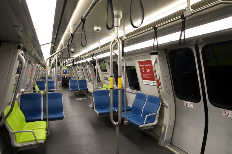 A Bay Area Rapid Transit (BART) passenger rides in an empty train car on April 08, 2020 in San Francisco, California.