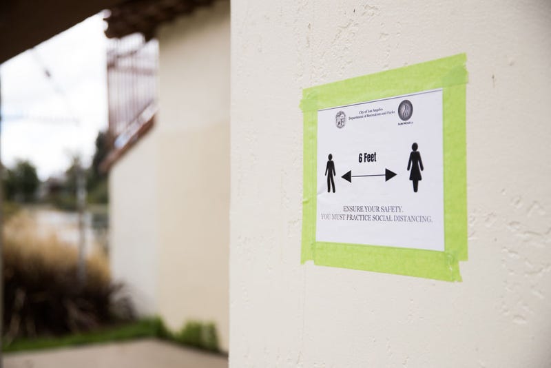Social distancing sign at Echo Park Lake.