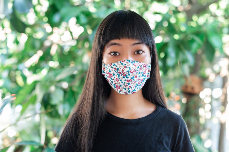 teenage girl wearing fabric mask