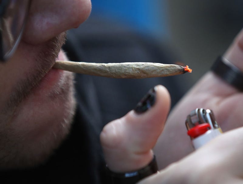 A recreational marijuana smoker indulges in smoking weed on April 14, 2020 in the Bushwick section of the Brooklyn borough of New York City.