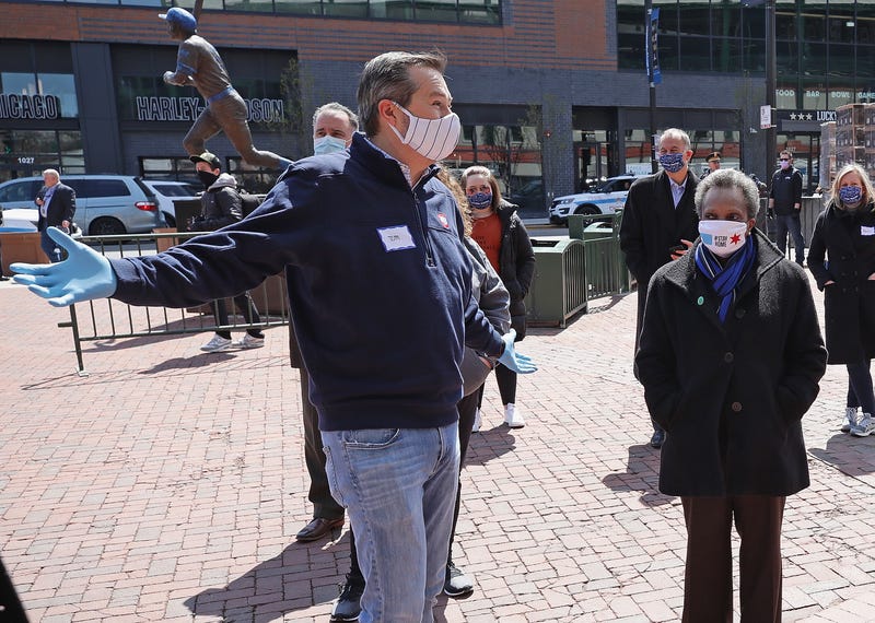 Chicago mayor Lori Lightfoot talks with Chicago Cubs chairman Tom Ricketts outside of Wrigley Field on April 16, 2020 in Chicago Illinois.